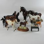 A collection of ten pottery models of horses to include Beswick and Royal Doulton,