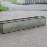 A galvanised trough,