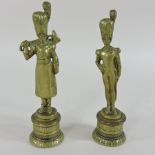 A 19th century brass military figure, 14cm high,