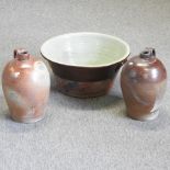 Two 19th century stoneware bottles, together with a bowl,