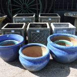 A pair of square planters, each 37cm, together with three smaller,