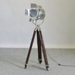 A standard lamp in the form of a stage light,