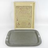 An early 20th century pewter tray, together with a George III sampler, worked by Mary Diver, 1779,