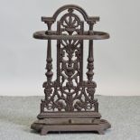An ornate cast iron stick stand,