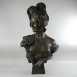 An Art Nouveau style portrait bust of a lady, signed C.