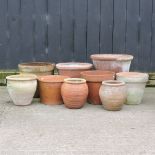 A collection of terracotta garden pots,