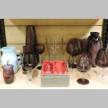 A collection of coloured glass, to include vases and goblets,