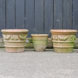 A pair of terracotta planters, each 48cm,
