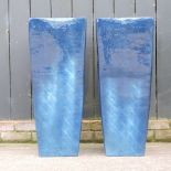 A pair of blue garden pots,