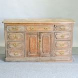 An antique pine sideboard,