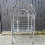 A metal parrot cage,