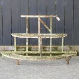 An antique painted iron three tier plant stand,