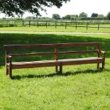 A large antique pine bench,