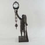 An aviator bronzed cased mystery clock,