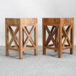 A pair of hardwood occasional tables, on square legs,