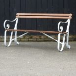 A hardwood garden bench, with painted metal ends,