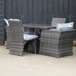 A rattan garden table, 120 x 60cm,