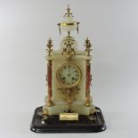 A French marble mantel clock, on stand,