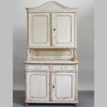 A 19th century continental pine and cream painted dresser,