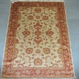 A Ziegler style carpet, with all over designs, on a cream ground,