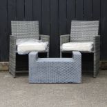 A pair of grey rattan garden chairs, together with a coffee table,