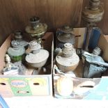 A collection of oil lamps,