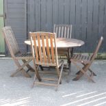 A circular teak garden table, 120cm,