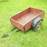 A wooden car trailer,