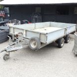 A large Ifor Williams galvanised flatbed dropside trailer,