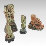 A Chinese carved soapstone vase, decorated in relief with roses, on a wooden stand, 26cm high,