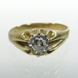 A gentleman's yellow metal single stone diamond ring, approximately 1.