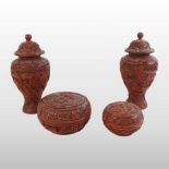 A pair of Chinese red cinnabar lacquer vases and covers,