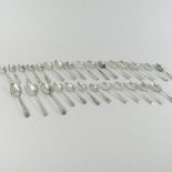 A collection of twenty-seven George III and later Old English pattern silver tea spoons,