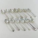 A collection of thirteen various 19th century and later silver table spoons,