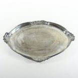 A Victorian silver tray, of oval shape, with shell mounded borders,