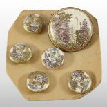 A set of six early 20th century Japanese Satsuma porcelain buttons, each painted with flowers,