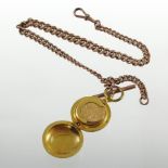 An early 20th century 9 carat rose gold fob chain, 33cm long, suspended with a gilt sovereign case,