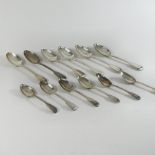 A set of six Victorian silver fiddle pattern table spoons, London 1876,