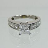 A 14 carat gold and platinum set diamond ring,