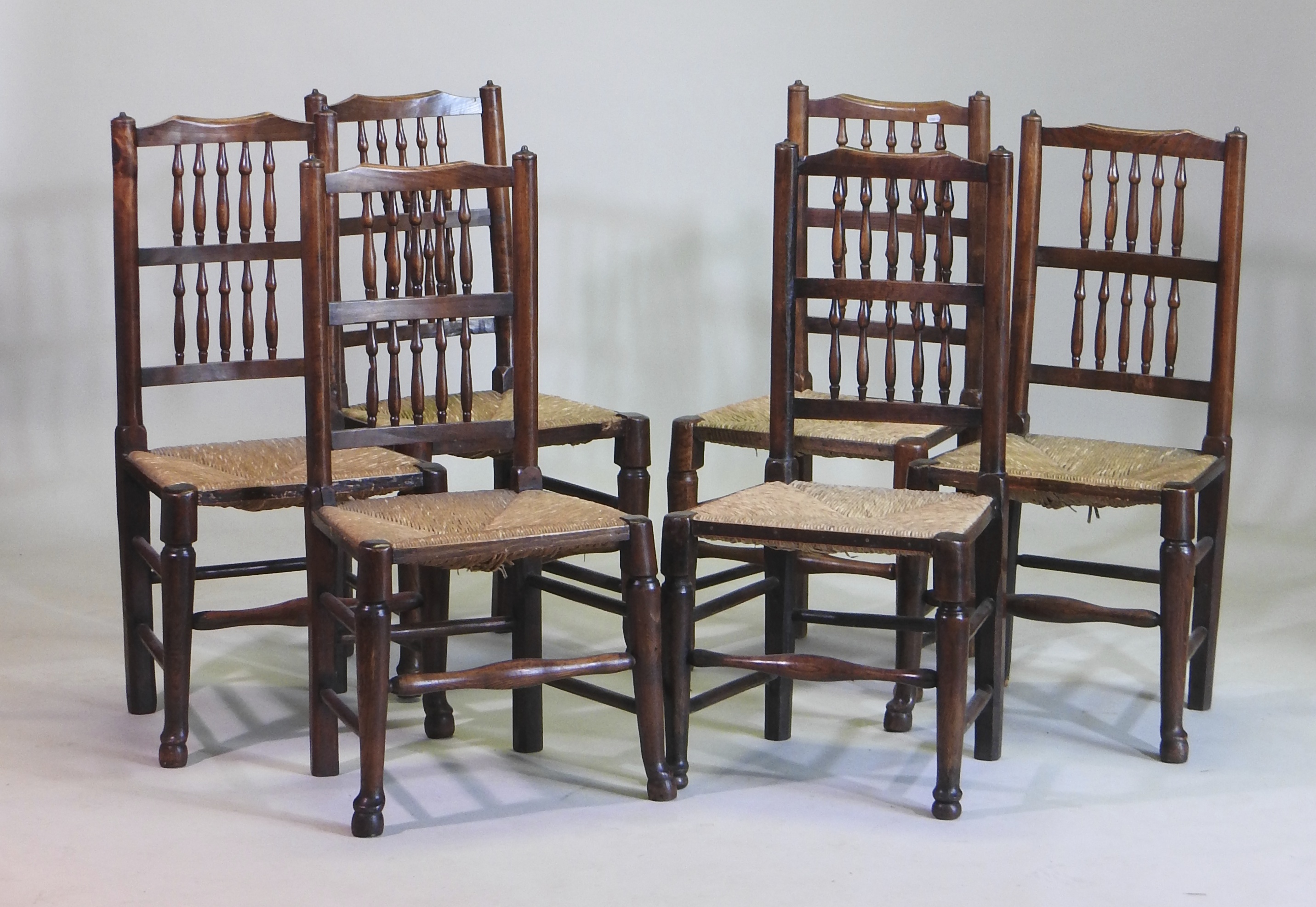 A harlequin set of six 19th century ash and elm spindle back dining chairs, with rush seats, - Image 2 of 2