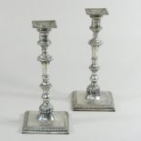 A pair of Georgian style silver table candlesticks, of knopped form, with removable sconces,
