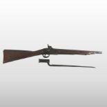 A 19th century percussion carbine rifle, the 51cm circular barrel mounted with bayonet,