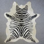 A Zebra style animal print rug,