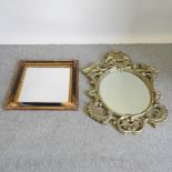 A gold painted Rococo style wall mirror, 128 x 81cm,