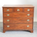 A 19th century mahogany chest of drawers, on bracket feet,