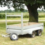 A twin axle metal frame car trailer, 245 x 124cm body,