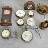 A collection of various wall clocks,