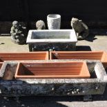A reconstituted stone planter, 90cm, together with another smaller,