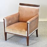 An Edwardian mahogany inlaid library chair