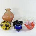 A collection of coloured art glass,